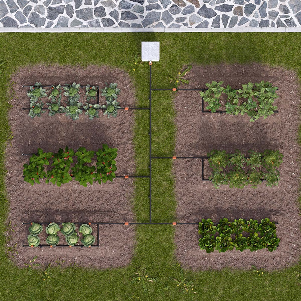 Orto Drip Kit installationseksempel i en hjemmehave, tilpasset vanding af forskellige plantetyper.